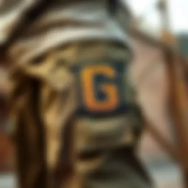 Close-up of unique letter graphics on cargo pants