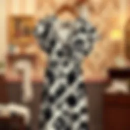 Elegant cow print nightgown displayed on a vintage hanger