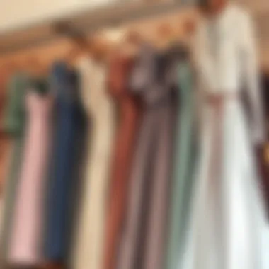 A collection of old fashioned dresses hanging in an elegant boutique, showcasing various styles and colors.