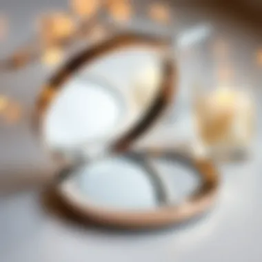 Modern Artistry in Compact Mirrors Artistic compact mirror showcasing modern design