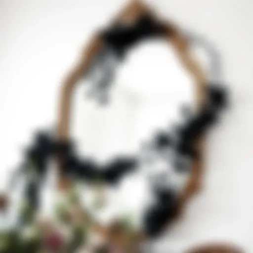 Elegant black floral garland draped across a vintage mirror