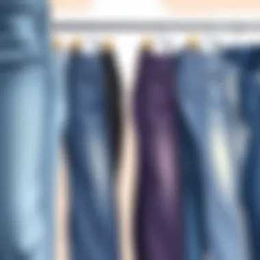 An array of different jean cuts displayed on a rack.