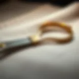 Close-up of small trimming scissors on a fabric swatch