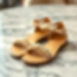 Elegant pearl sandals showcased on a marble surface, highlighting their intricate design.